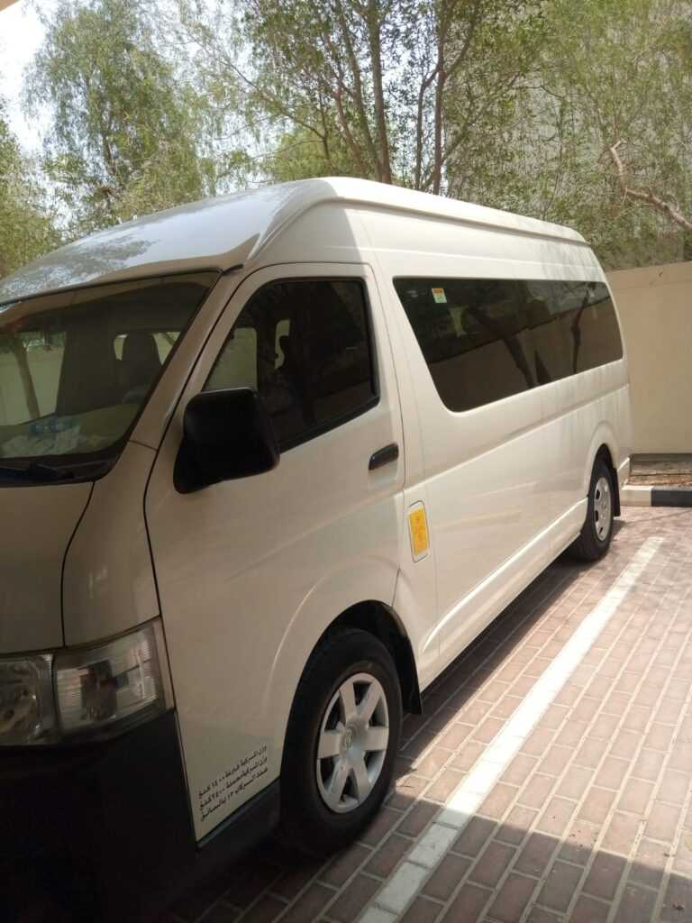 a white van parked in a parking lot